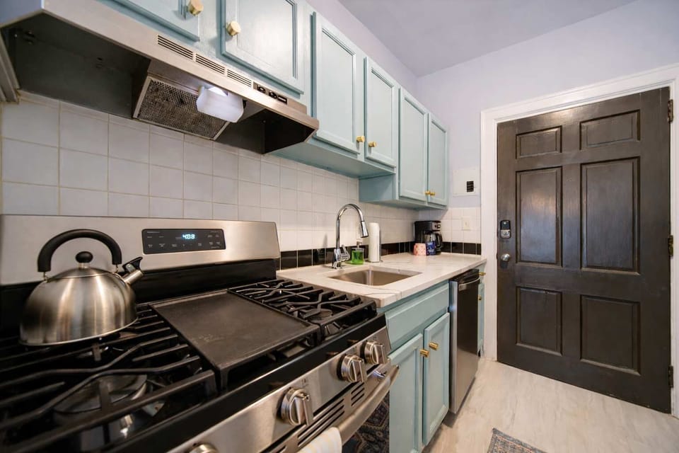 Prepare your favorite meals in a fully equipped kitchen featuring modern appliances and ample counter space.