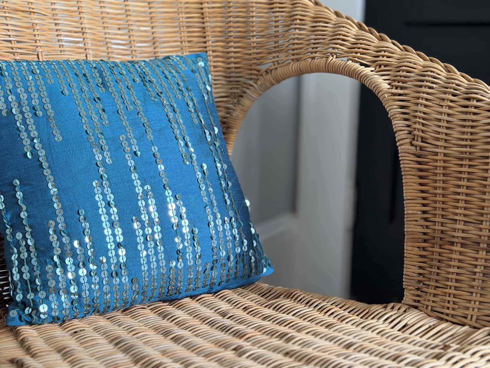 Stylish blue accent pillow detail