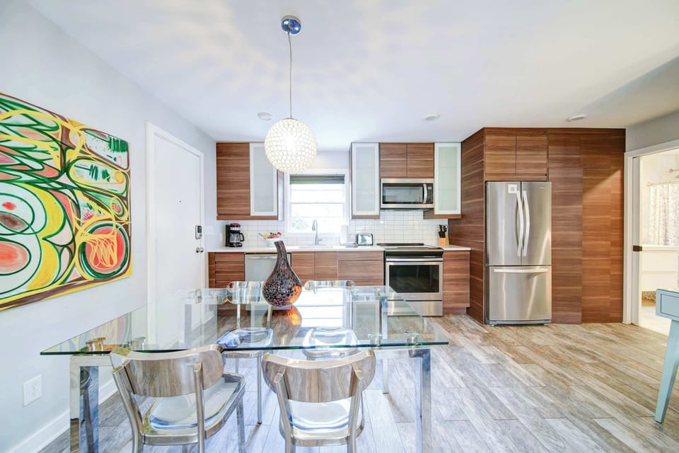 Enjoy the effortless flow between the kitchen and dining areas in this bright and airy open floor plan.