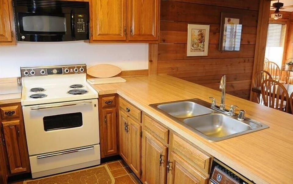 Charming kitchen with rustic touches offers a welcoming space to gather and enjoy meals together.