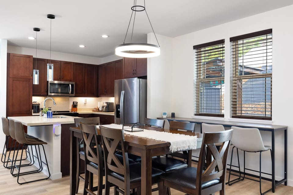 Bright dining space with modern seating and natural light throughout!