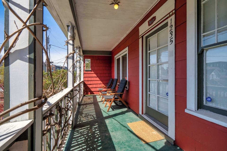 Covered patio with outdoor seating.