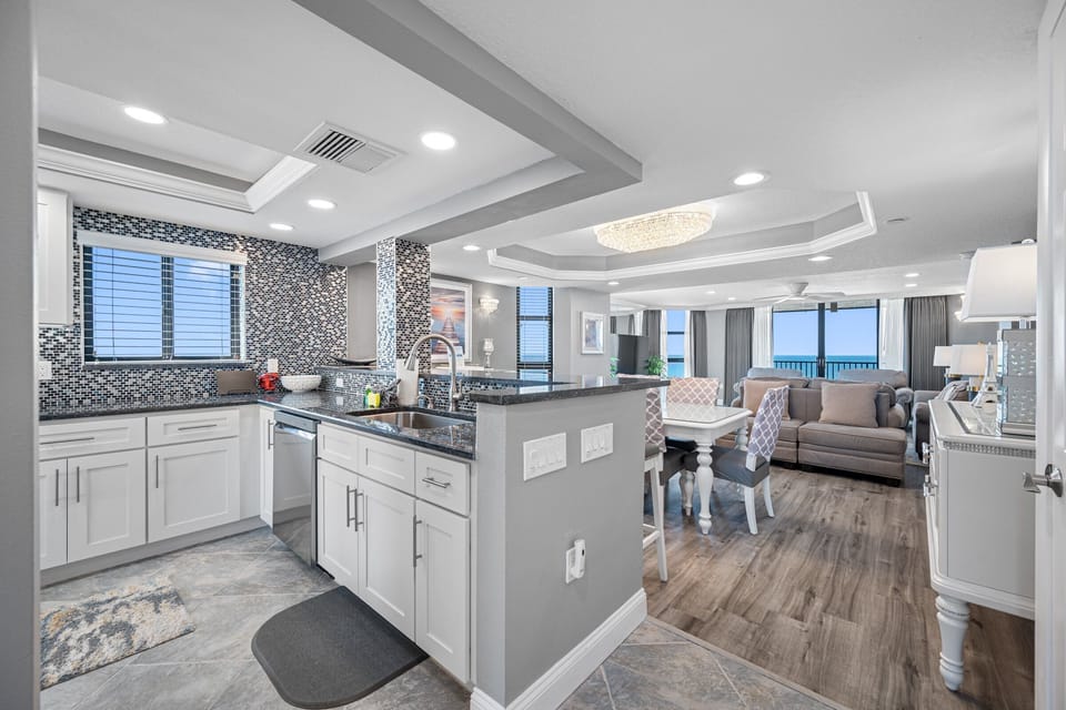 Open Kitchen & Living Area surrounded by water views!