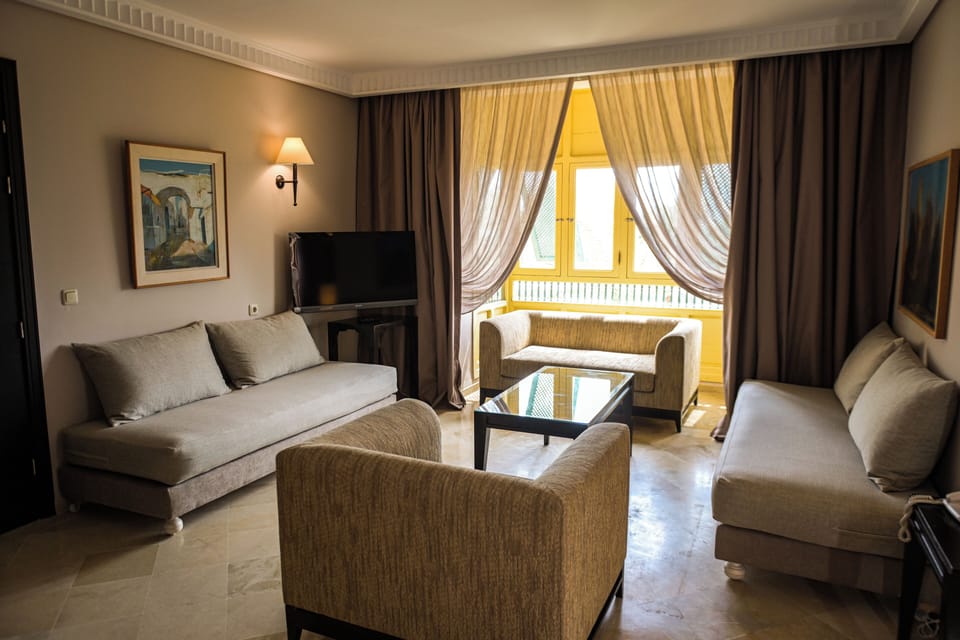 Junior Suite | Minibar, in-room safe, blackout drapes, free WiFi