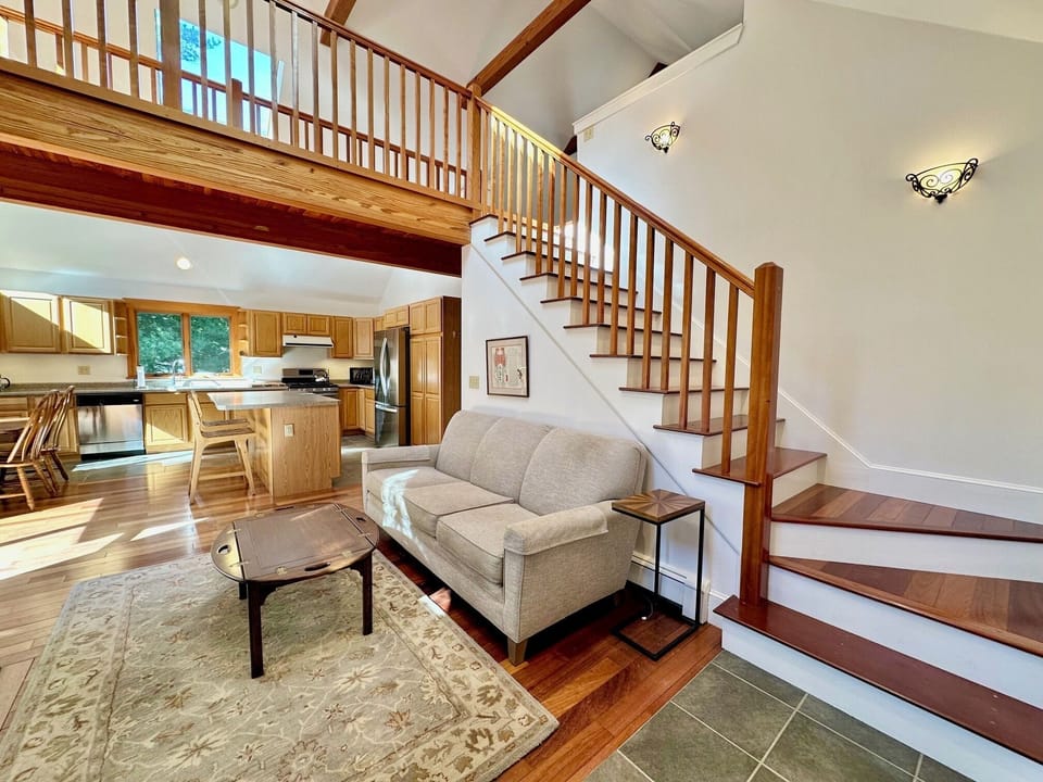 As you enter the home, you are greeted by the open living space-