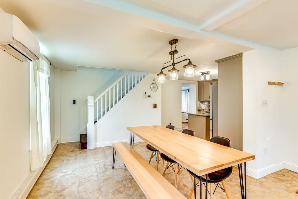 Dining table with comfortable seating for meals and games.
