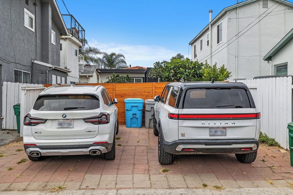 One parking spot by the alley