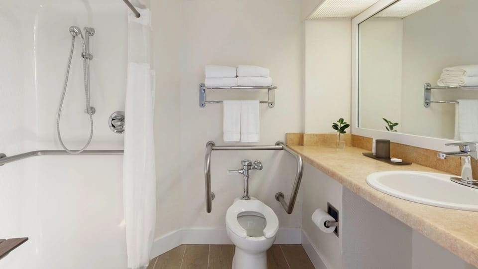 Refresh easily in a bright bath with accessible comforts.