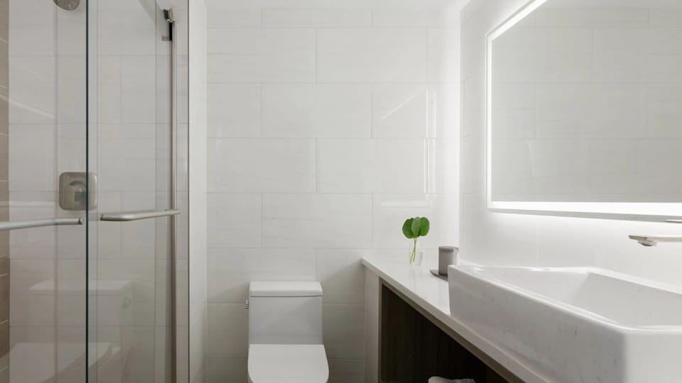 Refresh in a sleek, spa-like bath with glass shower.