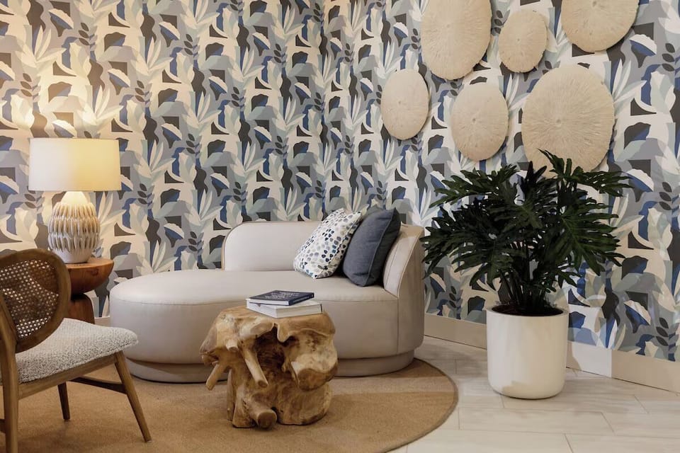Lounge in designer comfort surrounded by calming coastal textures.