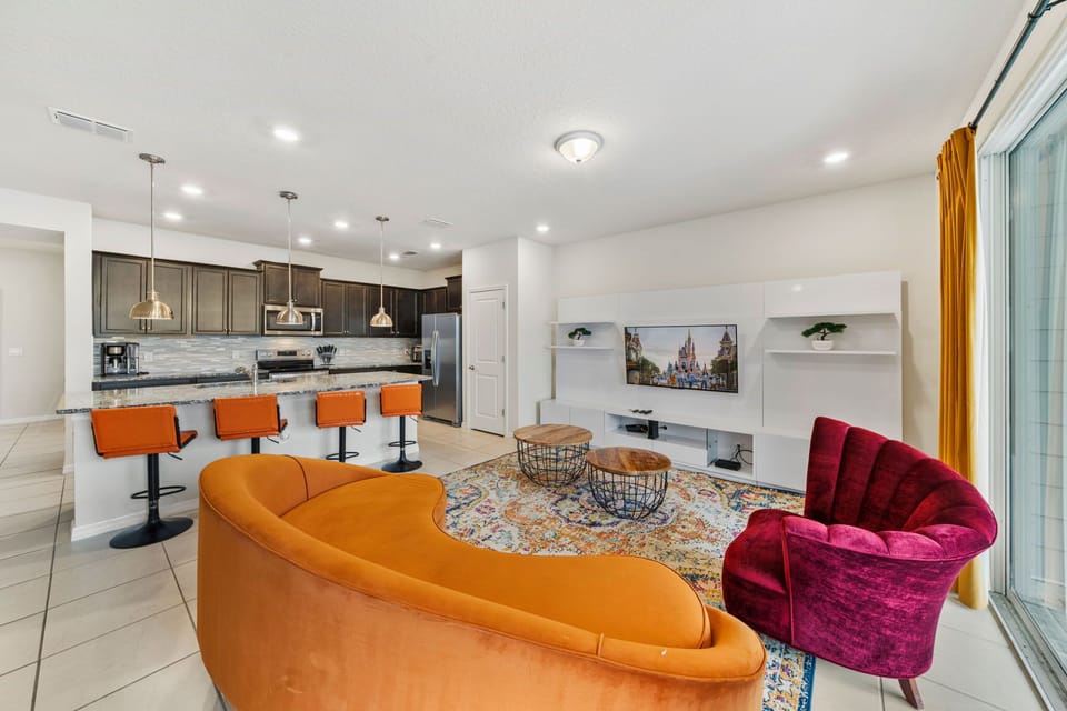 Spacious living room with cozy sofas — ideal for family gatherings after Disney adventures