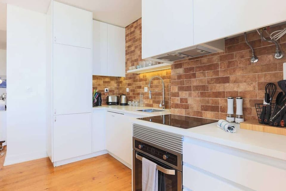 Functional kitchen with everything needed for home cooking • StayInLisbon