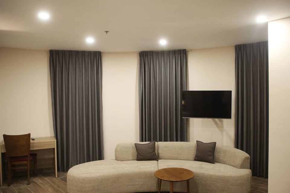 Deluxe Suite, City View | Minibar, desk, laptop workspace, free WiFi