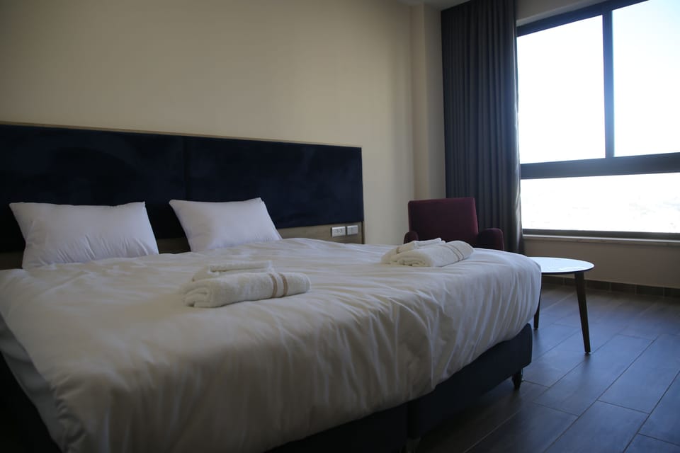 Family Room, City View | Minibar, desk, laptop workspace, free WiFi