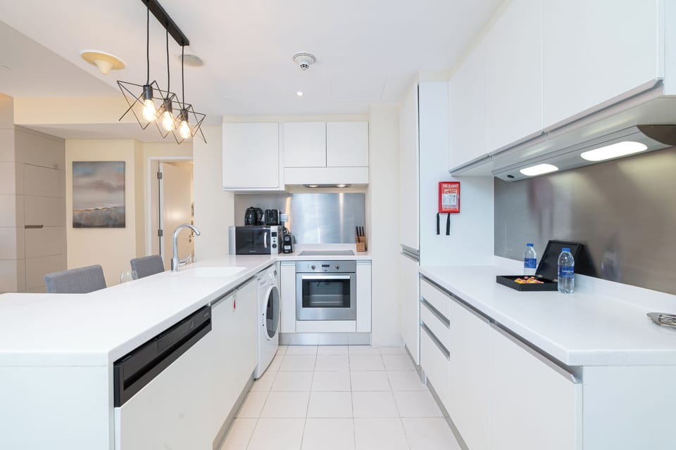 Luxury Studio, Balcony | Private kitchen | Full-size fridge, microwave, oven, stovetop