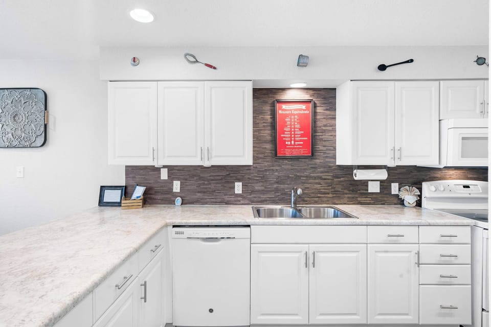 The open kitchen is well equipped for an unforgettable getaway​