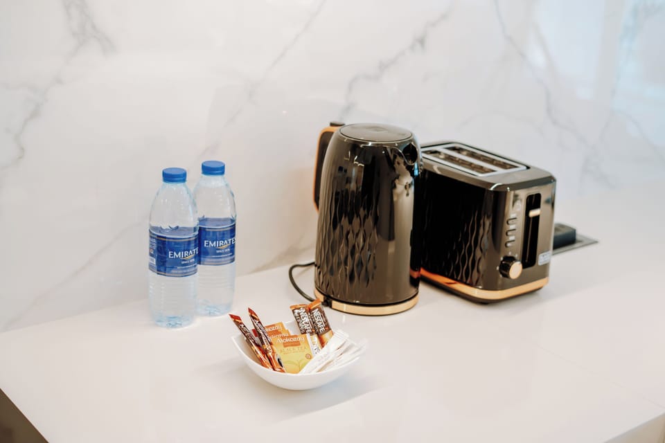 Luxury Studio, Balcony, City View | Private kitchenette | Full-size fridge, microwave, oven, stovetop