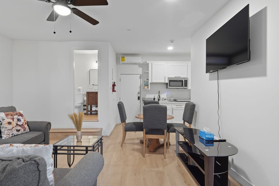Furniture, Indoors, Living Room, Screen, Table