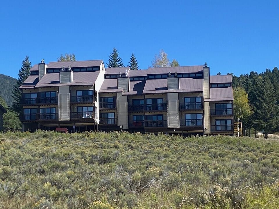Here is open rear of whole complex. Private covered parking is under unit. 