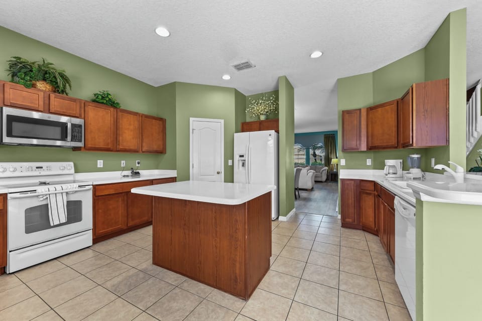 KITCHEN:  Side-by-Side Refrigerator, Microwave, Electric Stove & Oven and Dishwasher