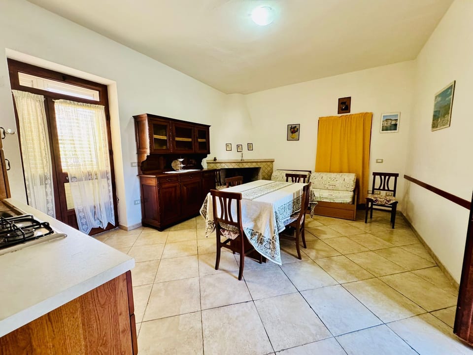 Apartment | Living area | 22-inch flat-screen TV with cable channels
