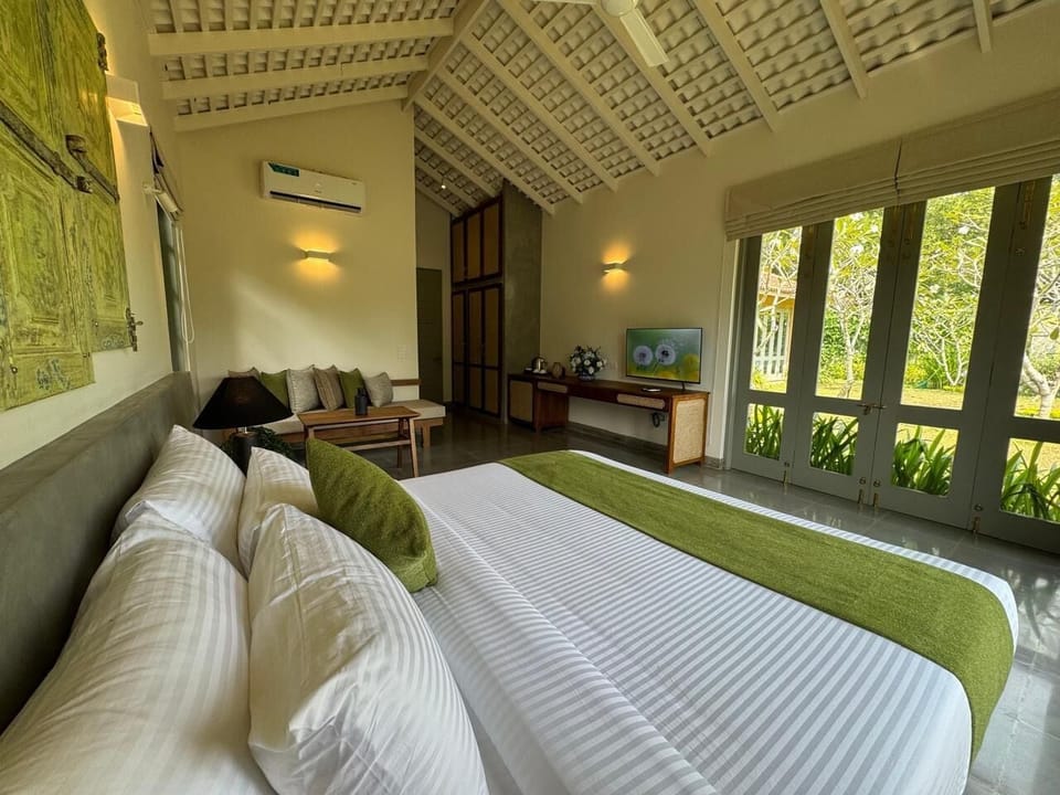 Luxury Villa, Garden View | In-room safe, desk, laptop workspace, iron/ironing board