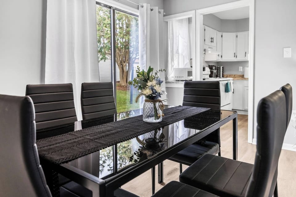 Sliding glass doors offer plenty of natural light and easy access to the backyard.