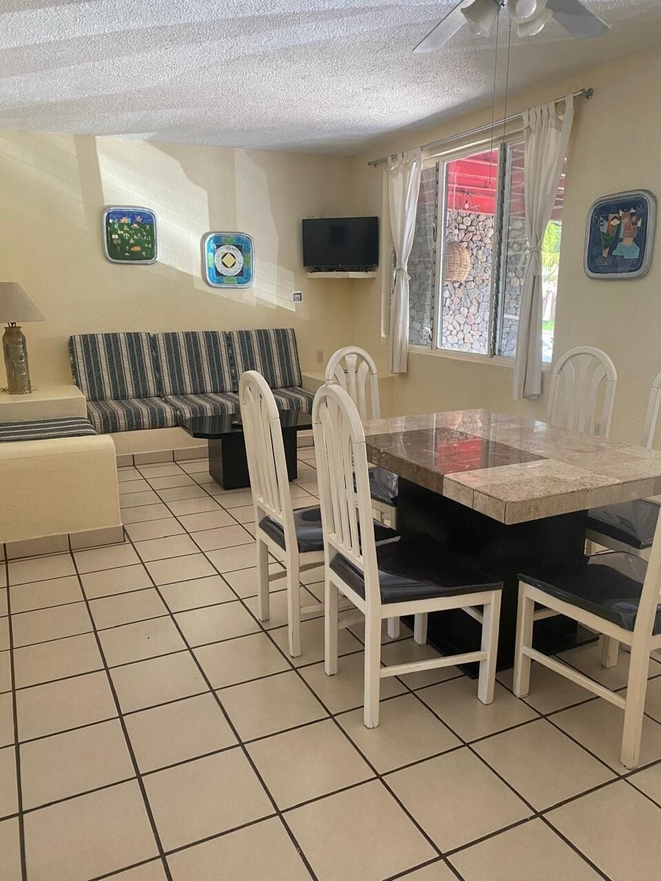 Family Quadruple Room, Partial Lake View | Living area | 40-inch TV with cable channels