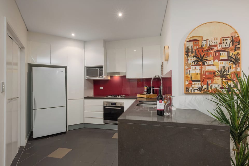 Design Apartment, River View | Private kitchen | Espresso maker, coffee/tea maker, electric kettle, highchair
