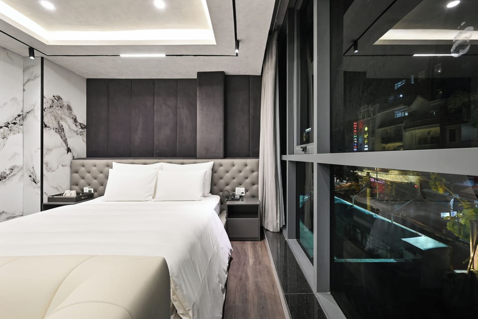 Junior Double Room | Free minibar items, desk, laptop workspace, blackout drapes
