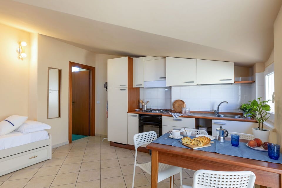 Furniture, Interior Design, Flooring, Floor, Chair, Ceiling, Home, Kitchen & Dining Room Table, Room, Apartment