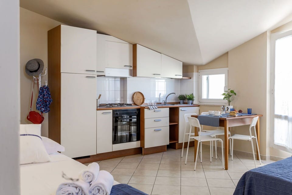 Furniture, Interior Design, Flooring, Floor, Chair, Room, Apartment, Home, Ceiling, Kitchen & Dining Room Table