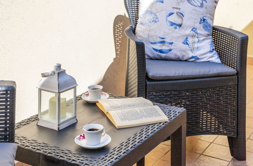 Furniture, Outdoor Furniture, Chair, Table, Wicker, Outdoor Table, Cushion, Coffee Table, Throw Pillow
