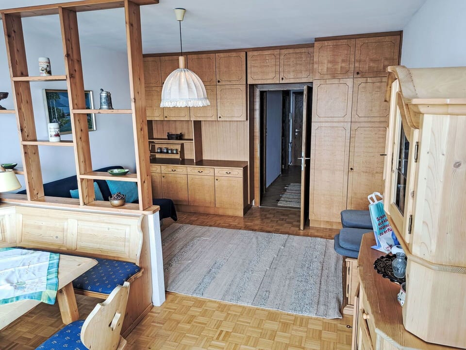 Furniture, Wood, Flooring, Interior Design, Floor, Room, Ceiling, Wood Stain, Chair, Hardwood