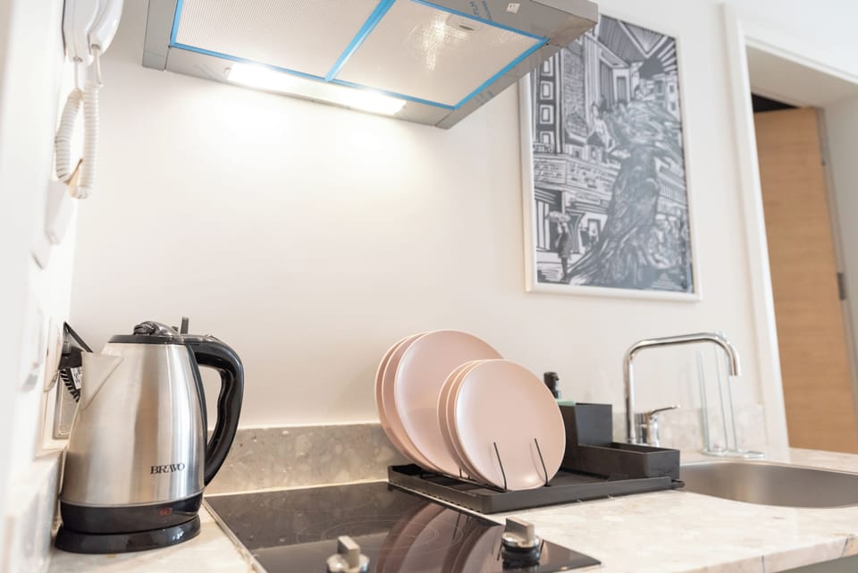 Superior Apartment, City View | Private kitchen | Microwave