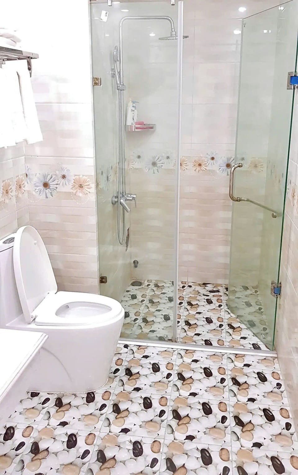 Shower, hair dryer, slippers, towels