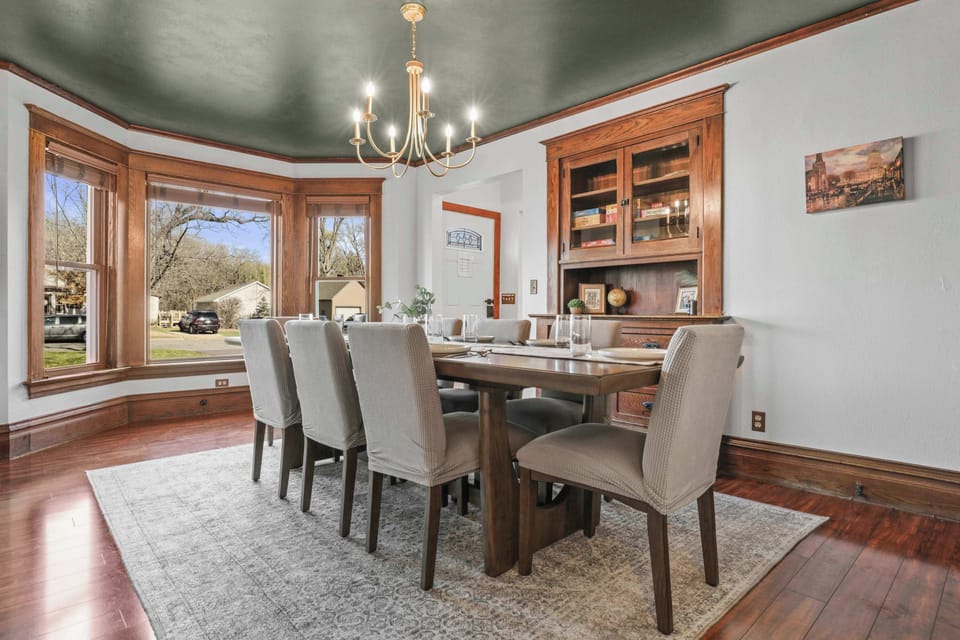 Formal dining room that can comfortably seat 8. The dining room is off the kitchen, which also has 4 seats at the island. The hutch also stores all the board games.