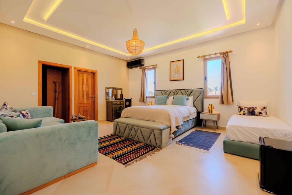 Luxury Suite, Garden View | Blackout drapes, soundproofing, iron/ironing board, free WiFi