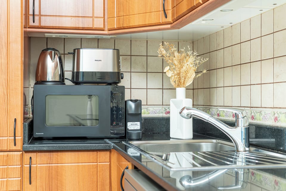 Luxury Apartment, Partial Sea View | Private kitchen | Full-size fridge, microwave, oven, stovetop