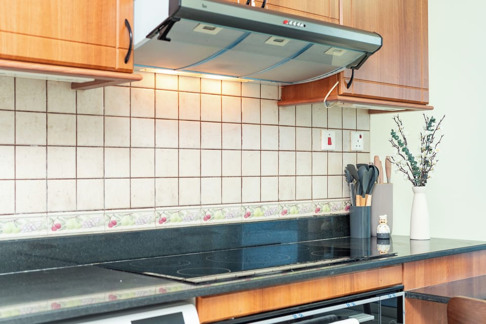 Luxury Apartment, Partial Sea View | Private kitchen | Full-size fridge, microwave, oven, stovetop