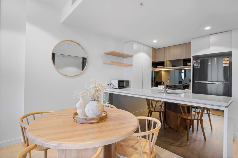 Fully equipped kitchen with quality appliances and sleek stone benchtops