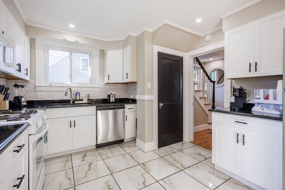 Beautifully designed kitchen fully equipped with modern appliances, cookware, coffee maker so you can start your mornings with a fresh cup of coffee.