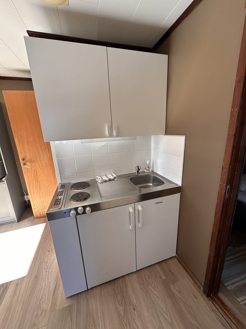 Cabin, 2 Bedrooms | Private kitchen | Shared fridge, microwave, cookware/dishes/utensils, cleaning supplies