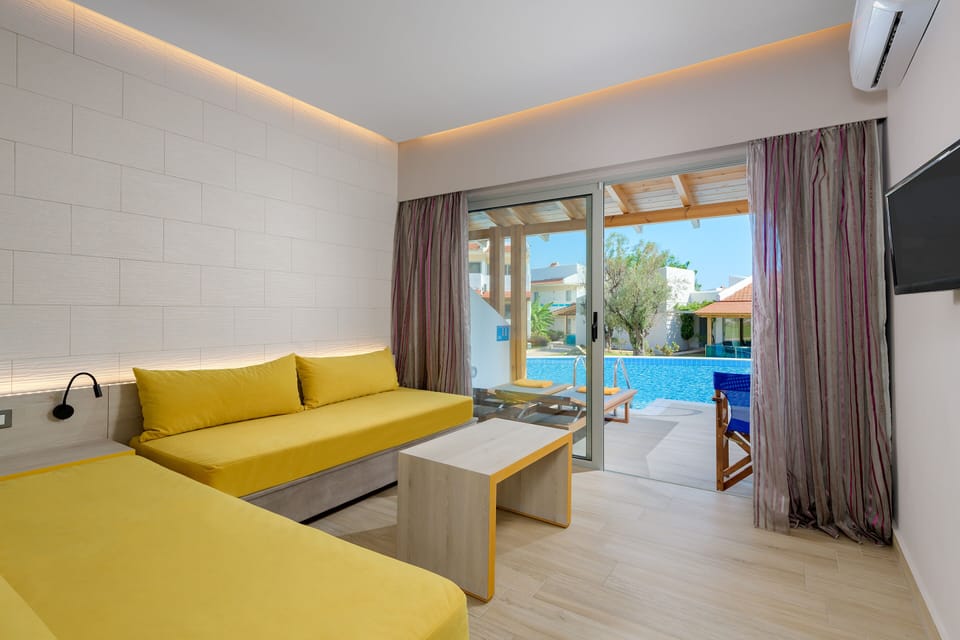 Deluxe Suite (with Sharing Pool) | Desk, laptop workspace, blackout drapes, soundproofing