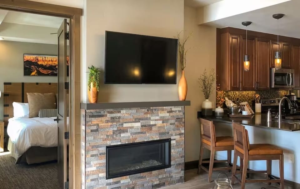 Master bed, living room and kitchen