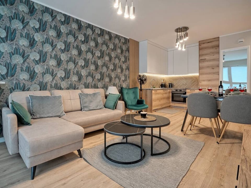 Living Room with Sofa Bed, Smart TV and Dining Table | Book Now with RENTUJEMY.COM