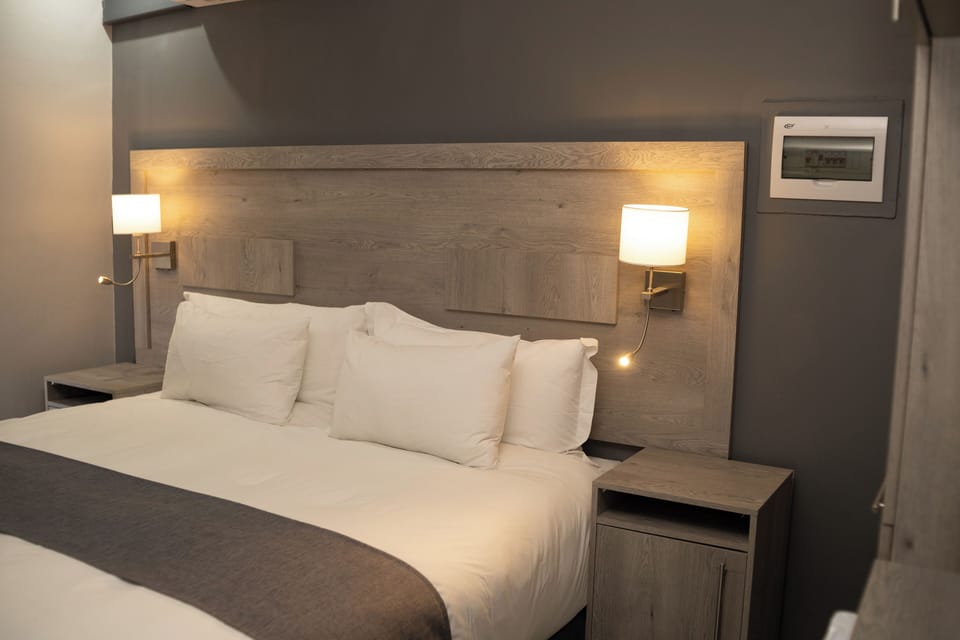 Standard Double Room, Courtyard View | Iron/ironing board (on request), WiFi (free)