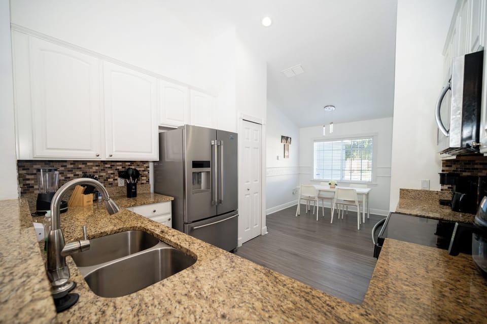 Cook, chat, and laugh together - the heart of the home.