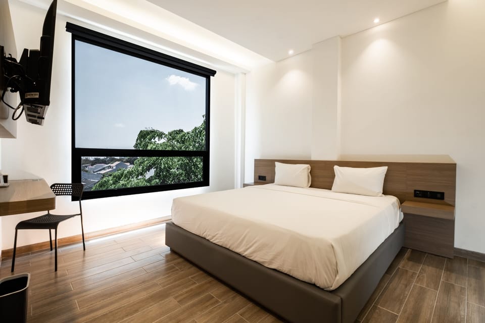 Superior Double Room, City View | Desk, blackout drapes, iron/ironing board, free WiFi