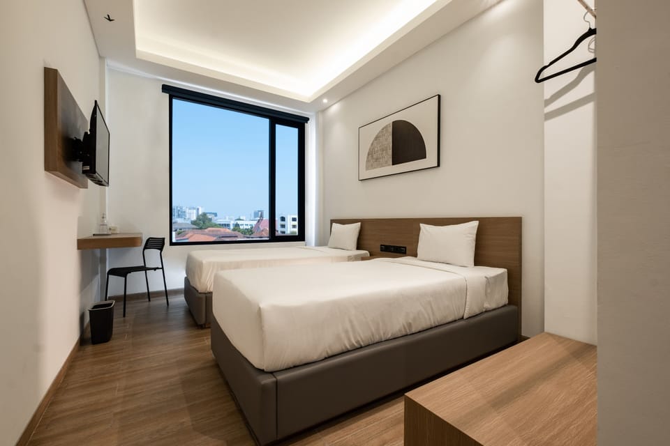 Superior Twin Room | Desk, blackout drapes, iron/ironing board, free WiFi